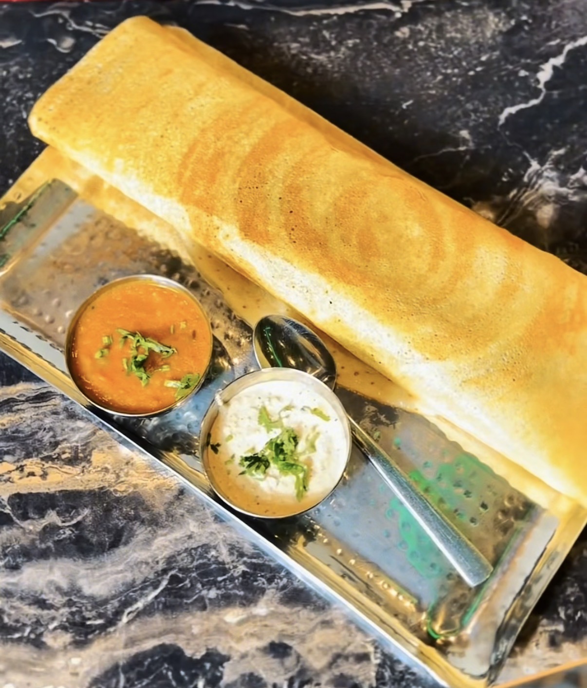 Masala dosa with chutney and sambar